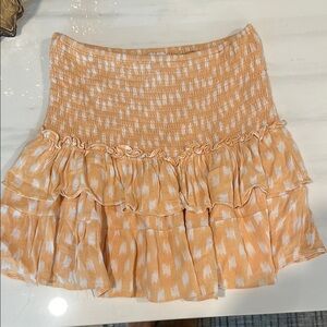 Peach/orange and white Ruffle Skirt Isabelles cabinet